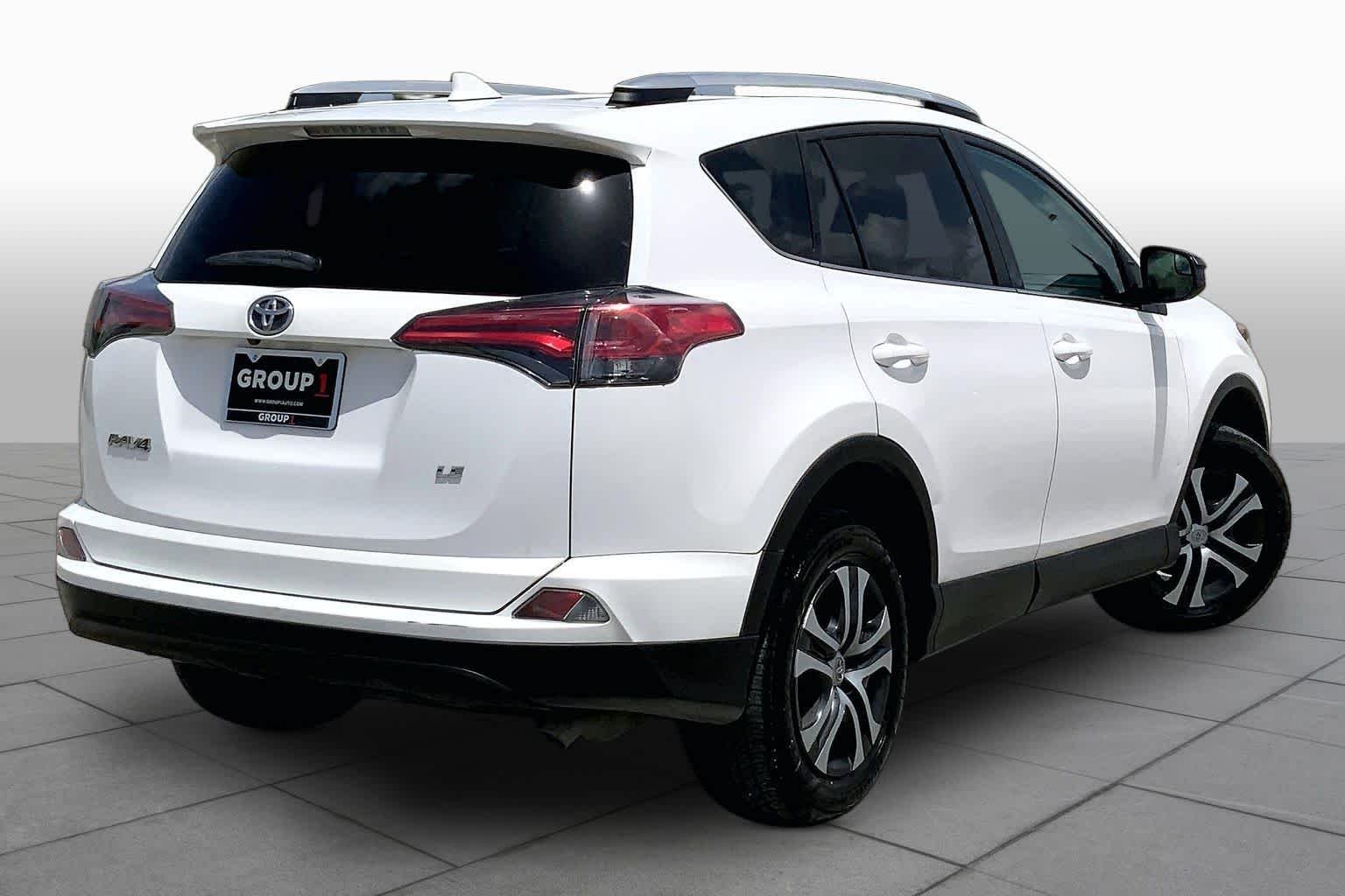 Used 2016 Super White Toyota LE image 13