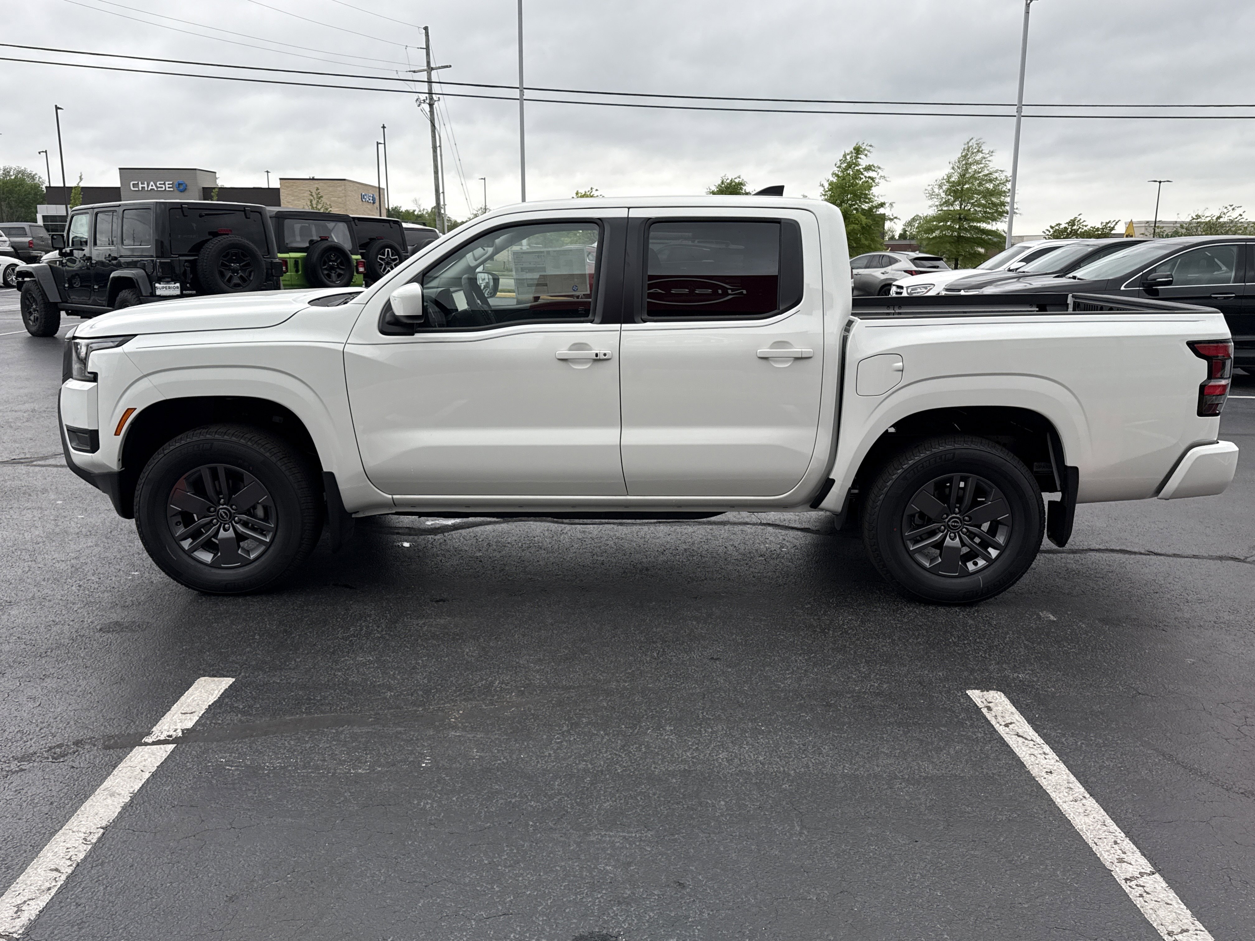 New 2026 Glacier White Nissan Crew Cab SV image 10