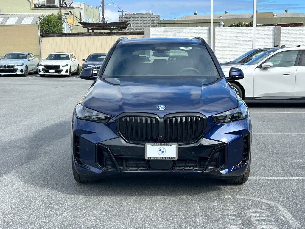 New 2026 Tanzanite Blue II Metallic BMW xDrive50e image 8