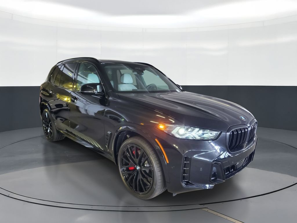 New 2026 Black Sapphire Metallic BMW M60i image 2