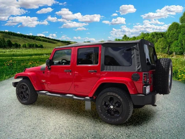 Used 2015 Red Jeep Unlimited Sahara image 4