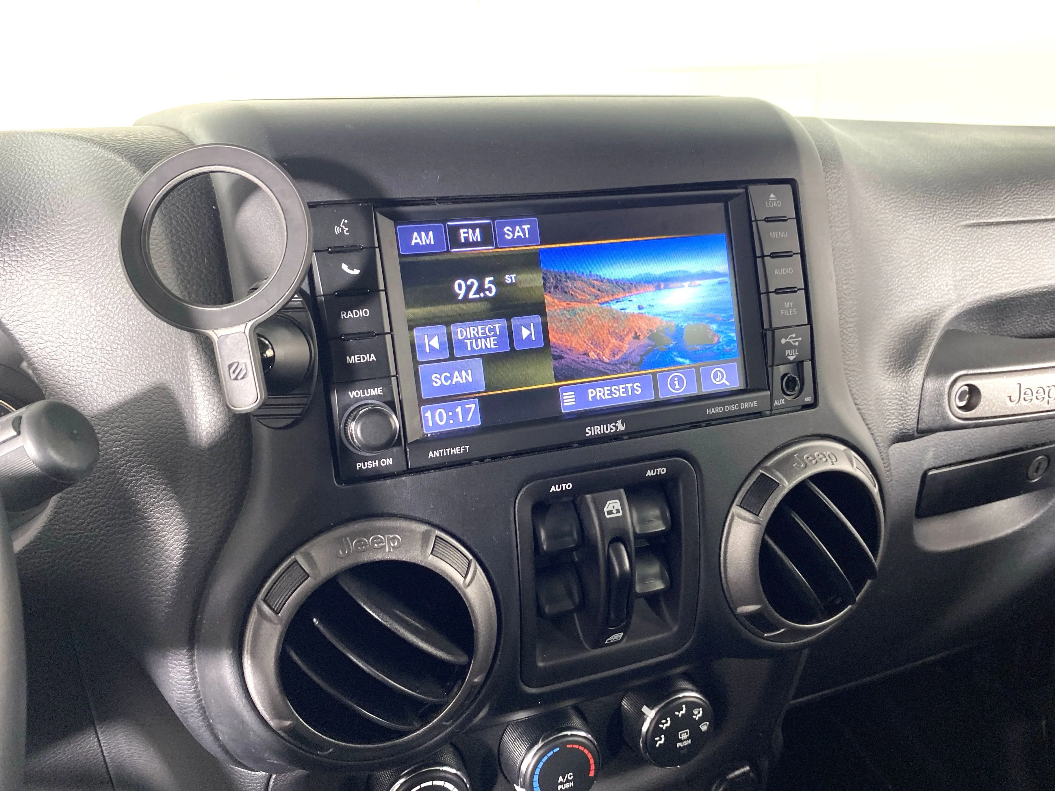 Used 2018 Granite Crystal Metallic Clearcoat Jeep Sport S image 23