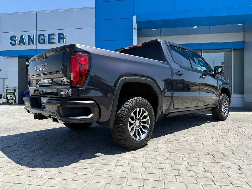 Used 2023 Titanium Rush Metallic GMC AT4 image 9