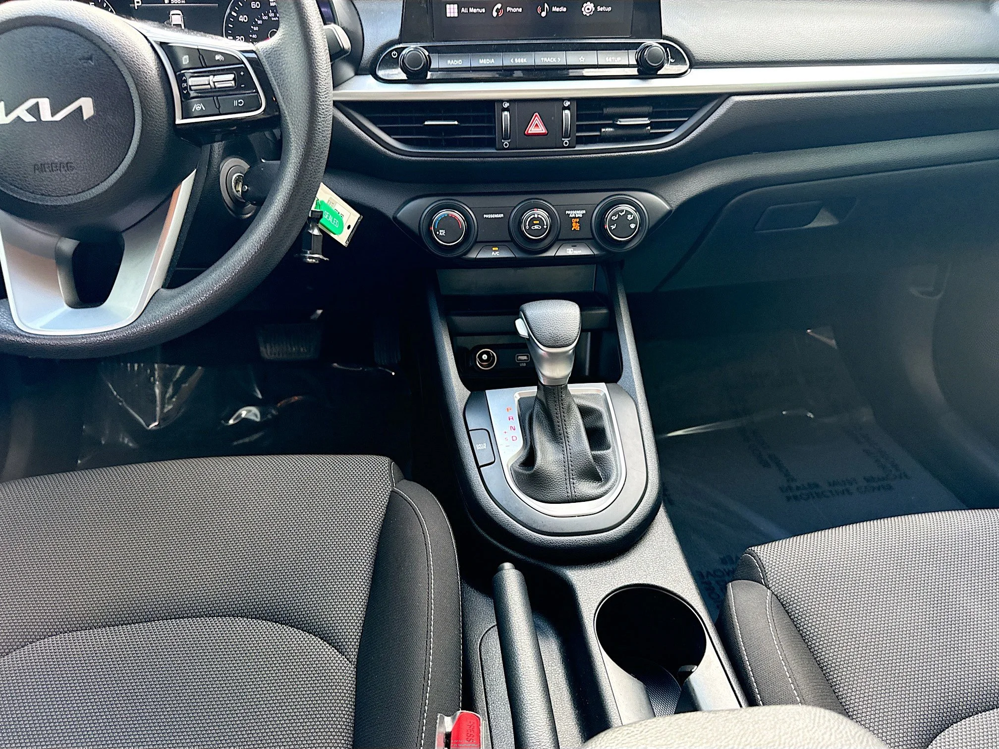 Used 2024 Snow White Pearl Kia LXS image 17