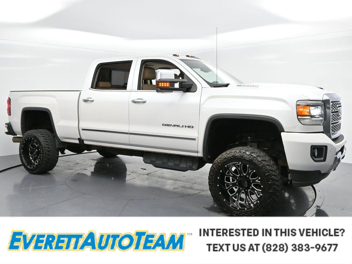 Used 2019 White Frost Tricoat GMC Denali image 1