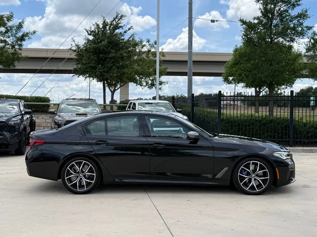 Used 2023 Black BMW M550i xDrive image 5