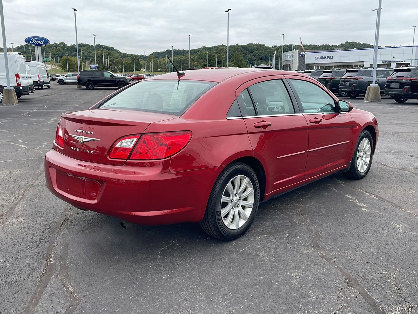 Used 2010 Inferno Red Crystal Pearl Chrysler Limited image 5
