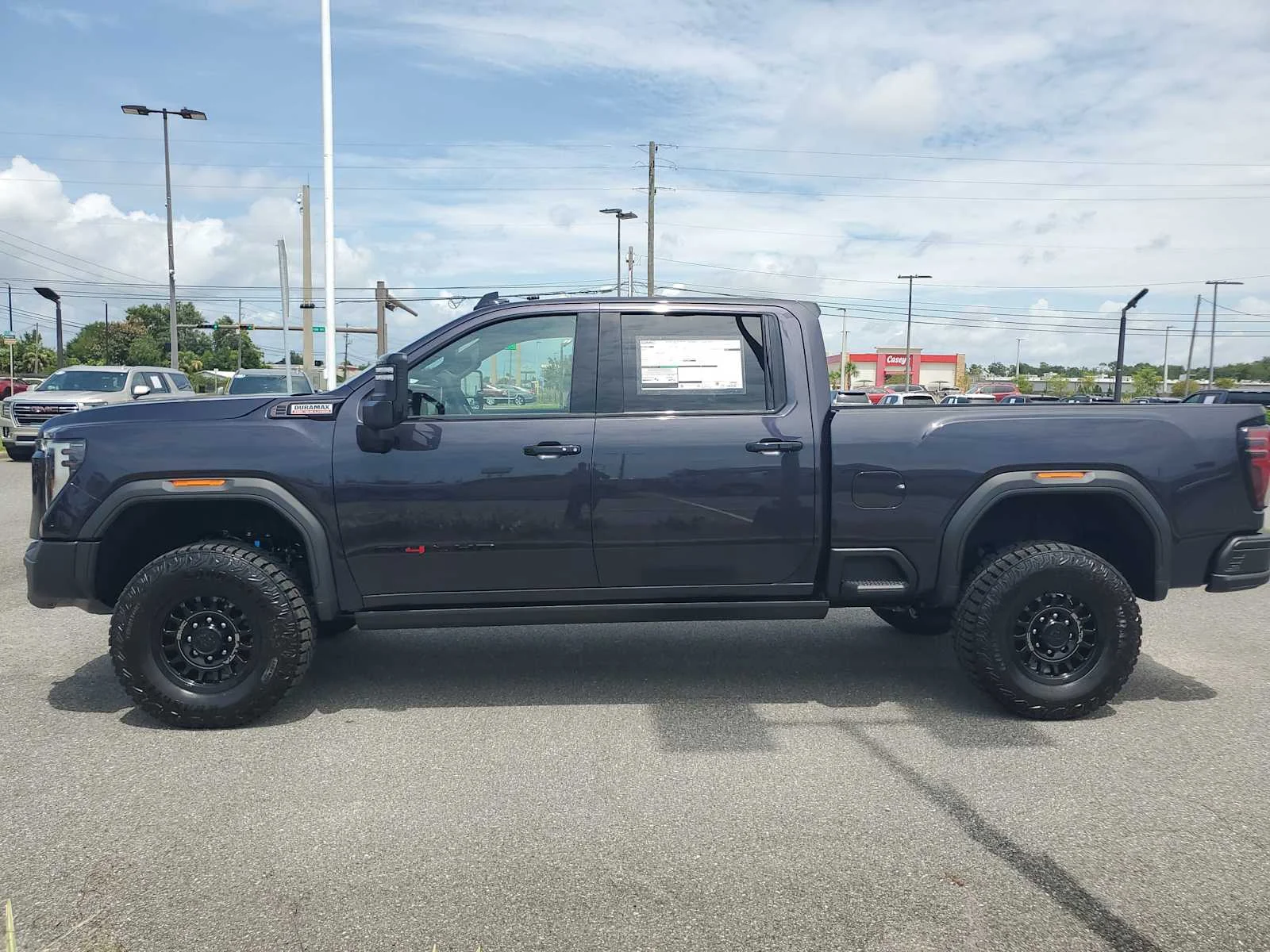 New 2026 Titanium Rush Metallic GMC AT4X image 2