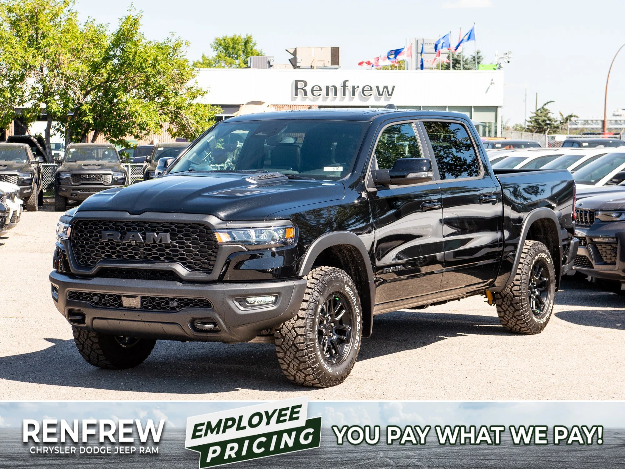 New 2026 Black RAM Rebel* Crew Cab 4x4, 33 Inch A/T Tires, Pano Sunroof, Passenger Screen image 1