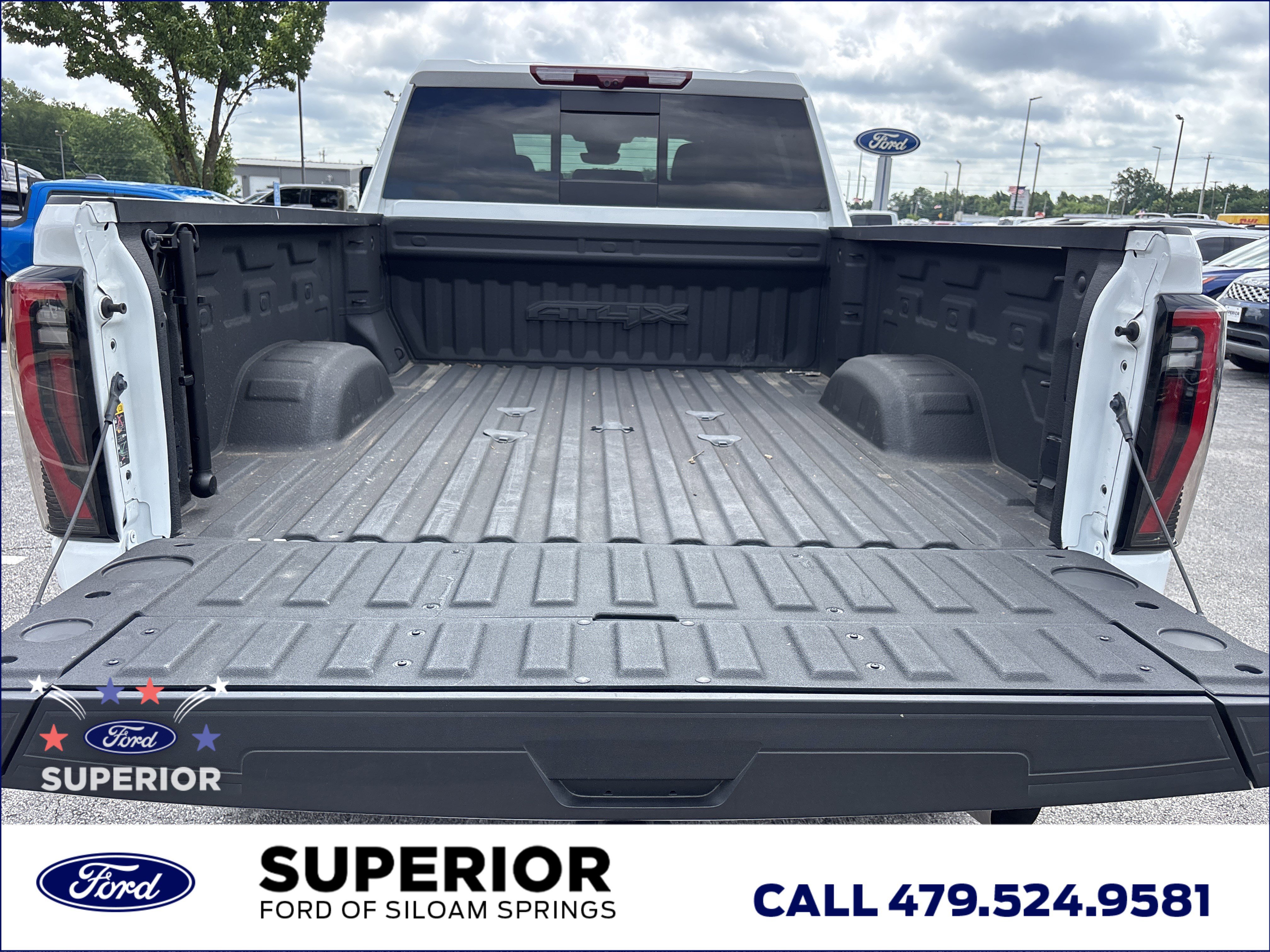 Used 2024 Summit White GMC AT4X Crew Cab 4WD image 7