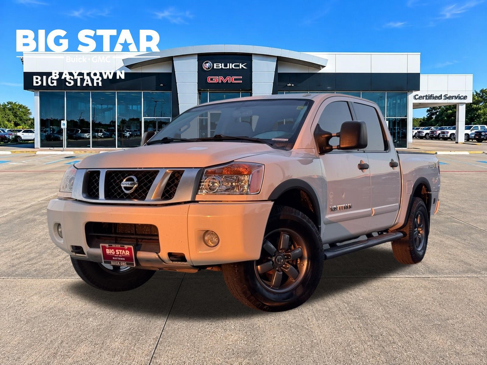 Used 2014 Glacier White Nissan PRO-4X image 1