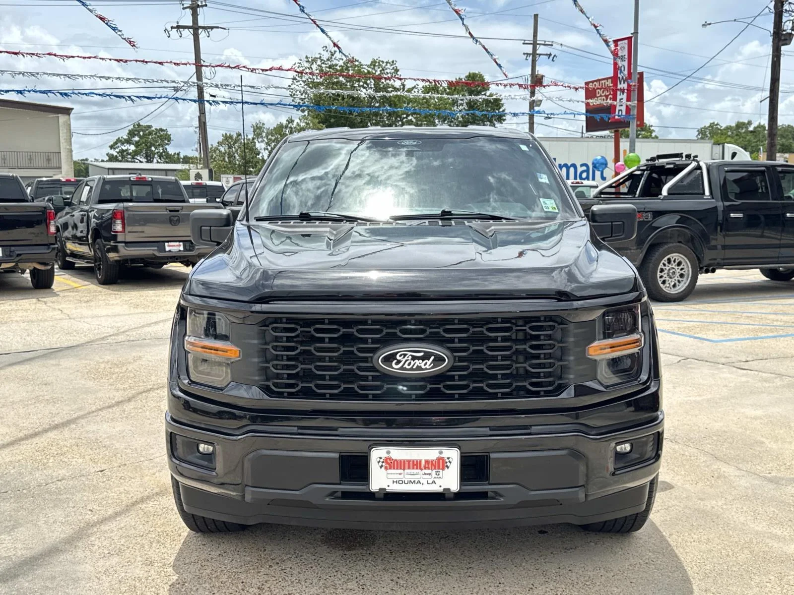 Used 2024 Agate Black Metallic Ford STX image 2