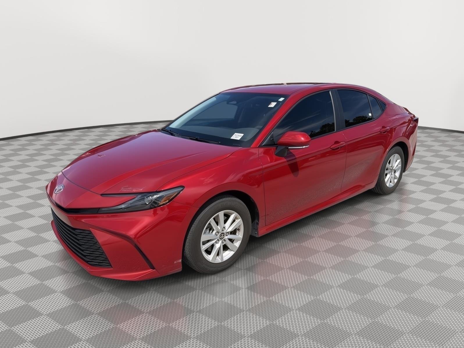 Used 2025 Supersonic Red Toyota LE image 1