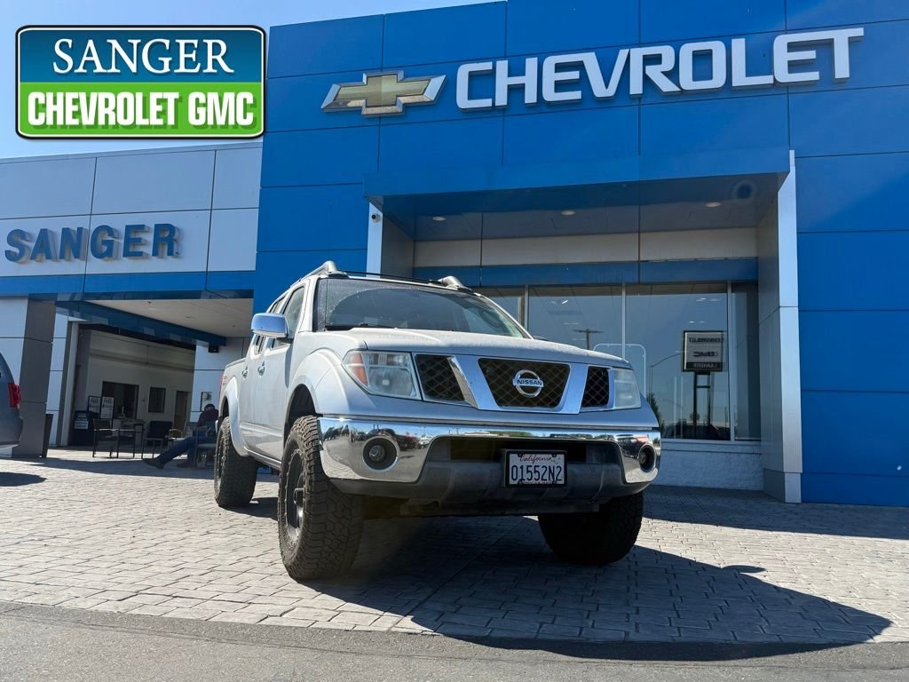Silver 2006 Nissan Frontier Nismo 4dr Crew Cab 4WD SB Pickup Truck Four-Wheel Drive
