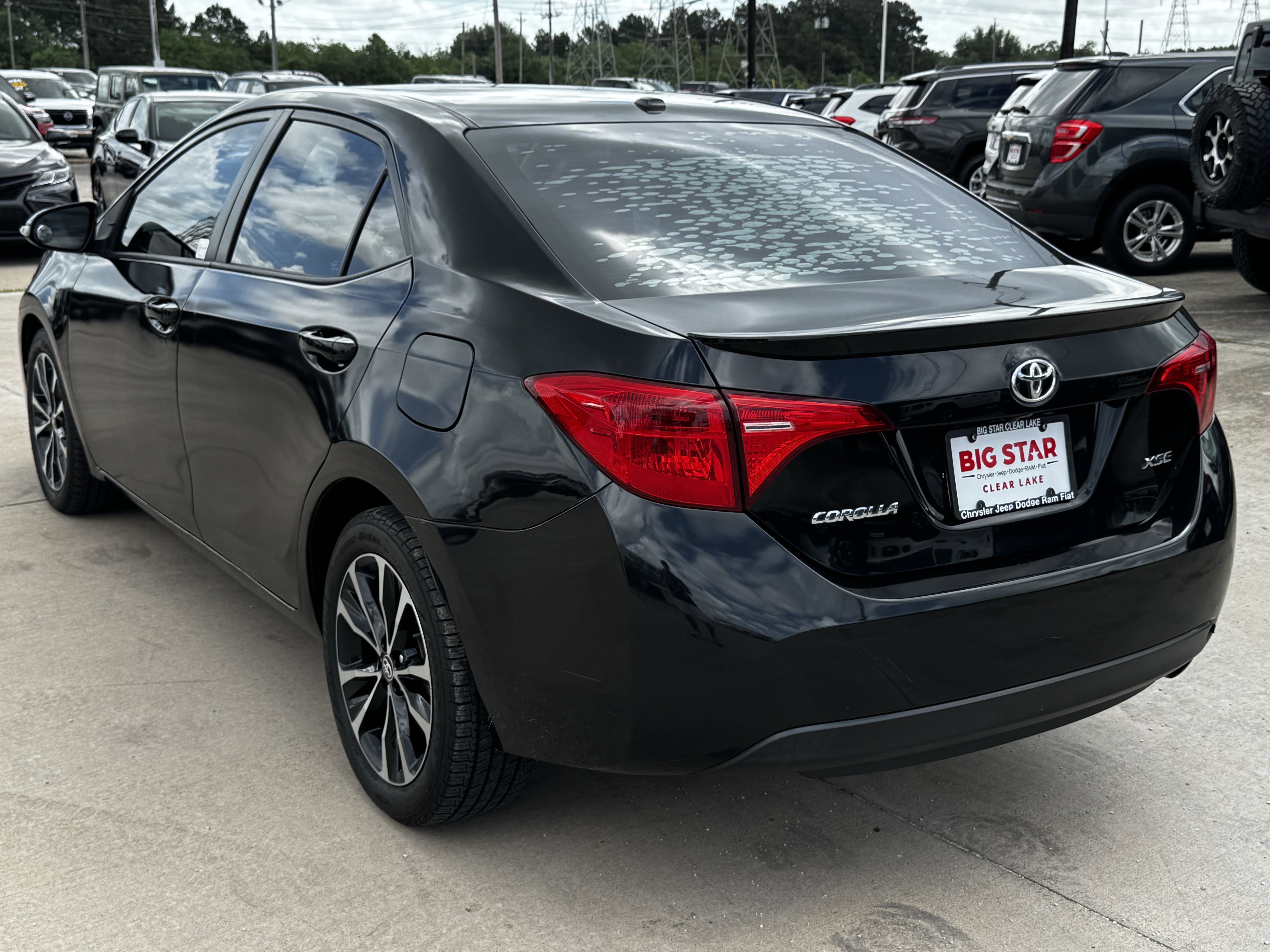 Used 2019 Black Sand Pearl Toyota L image 7