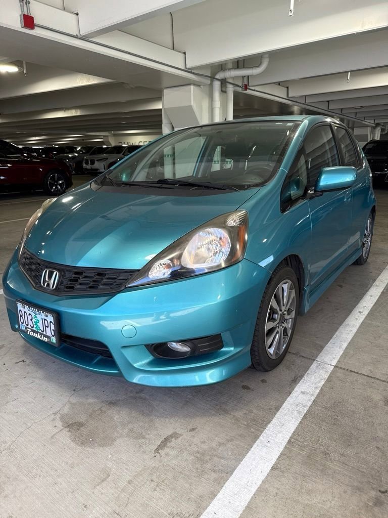 Used 2013 Blue Raspberry Metallic Honda Sport image 1