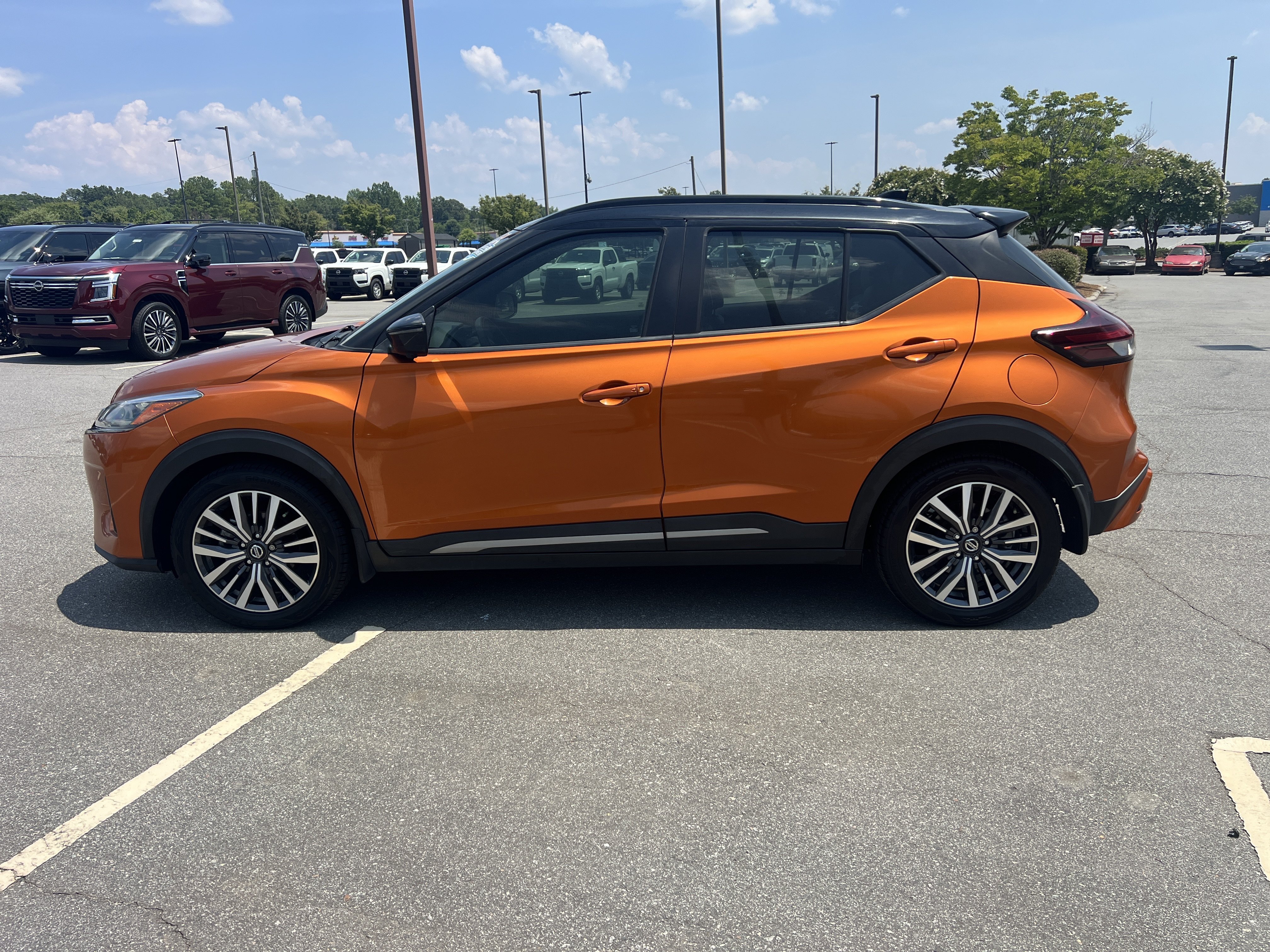 Certified Used 2021 Monarch Orange/Super Black Nissan SR image 8