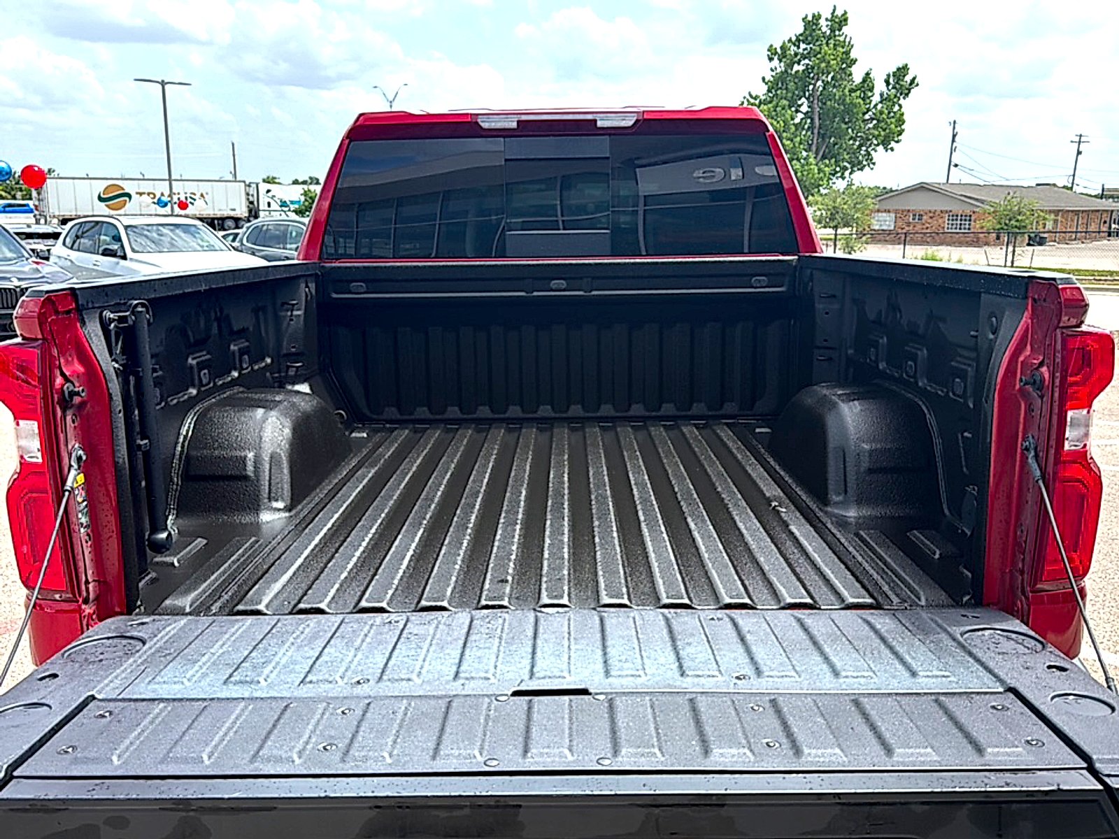 Used 2025 Radiant Red Tintcoat Chevrolet 4WD Crew Cab Short Bed LT Trail Boss image 7