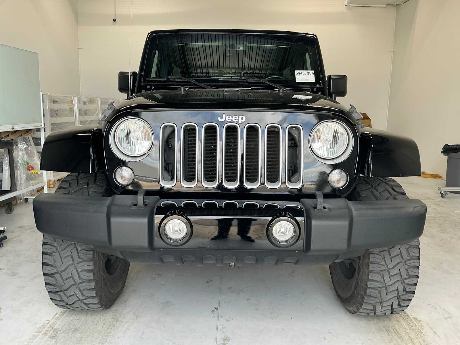 Used 2016 Black Clearcoat Jeep Sahara image 2