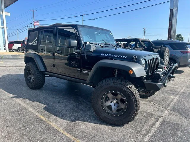Used 2015 Black Jeep Unlimited Rubicon image 1
