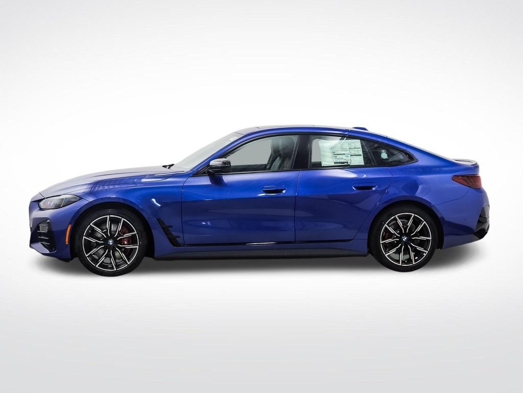 Used 2026 Blue Metallic BMW xDrive40 image 2
