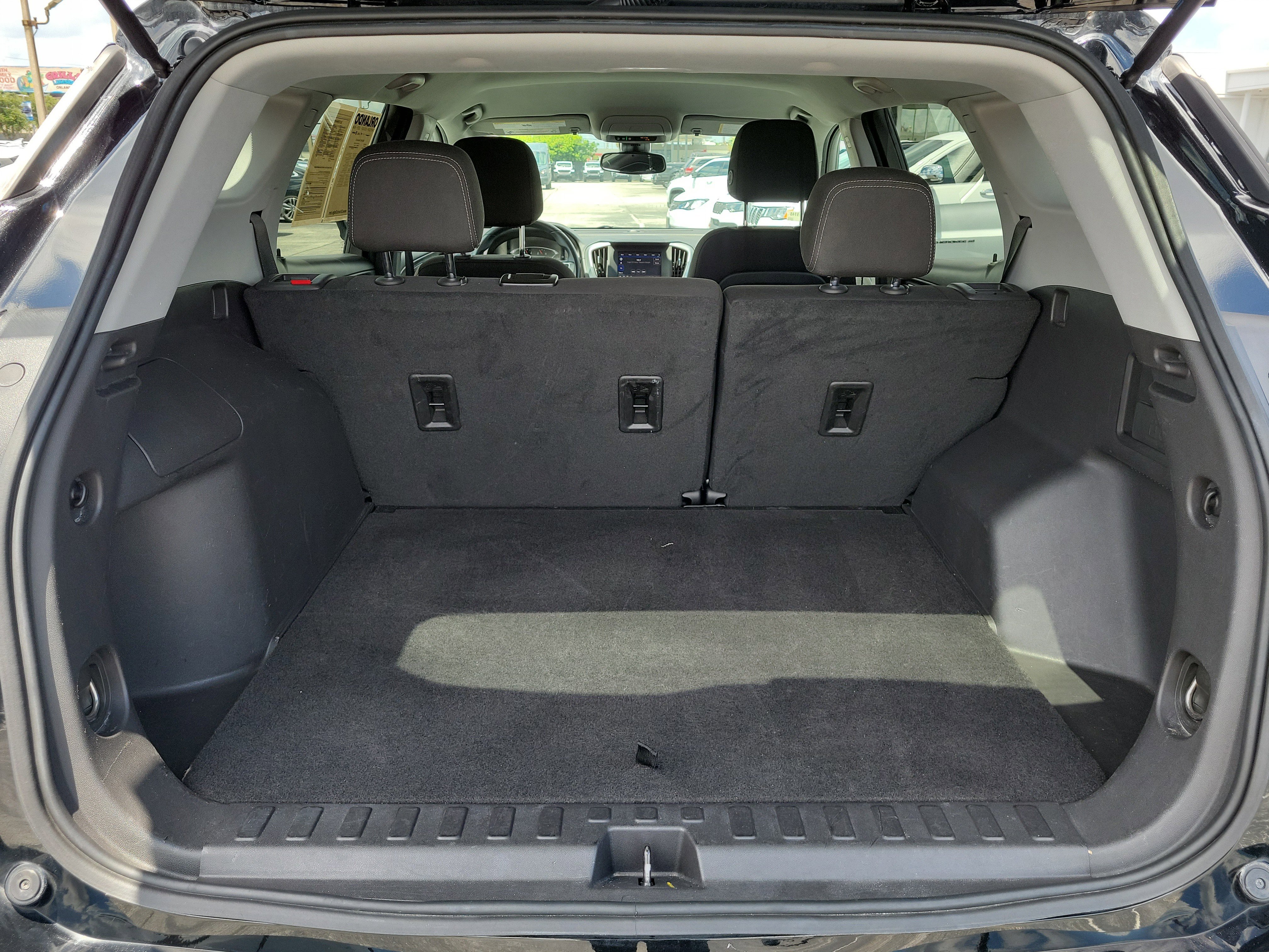 Used 2024 Ebony Twilight Metallic GMC SLE image 9