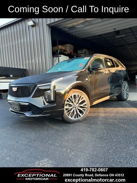 Used 2024 Black Cadillac Sport image 1
