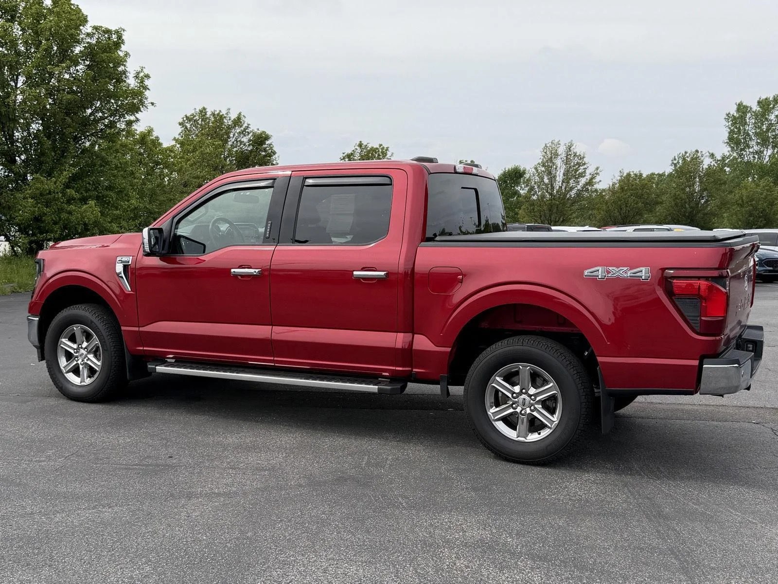 Used 2024 Rapid Red Metallic Tinted Clearcoat Ford XLT image 5
