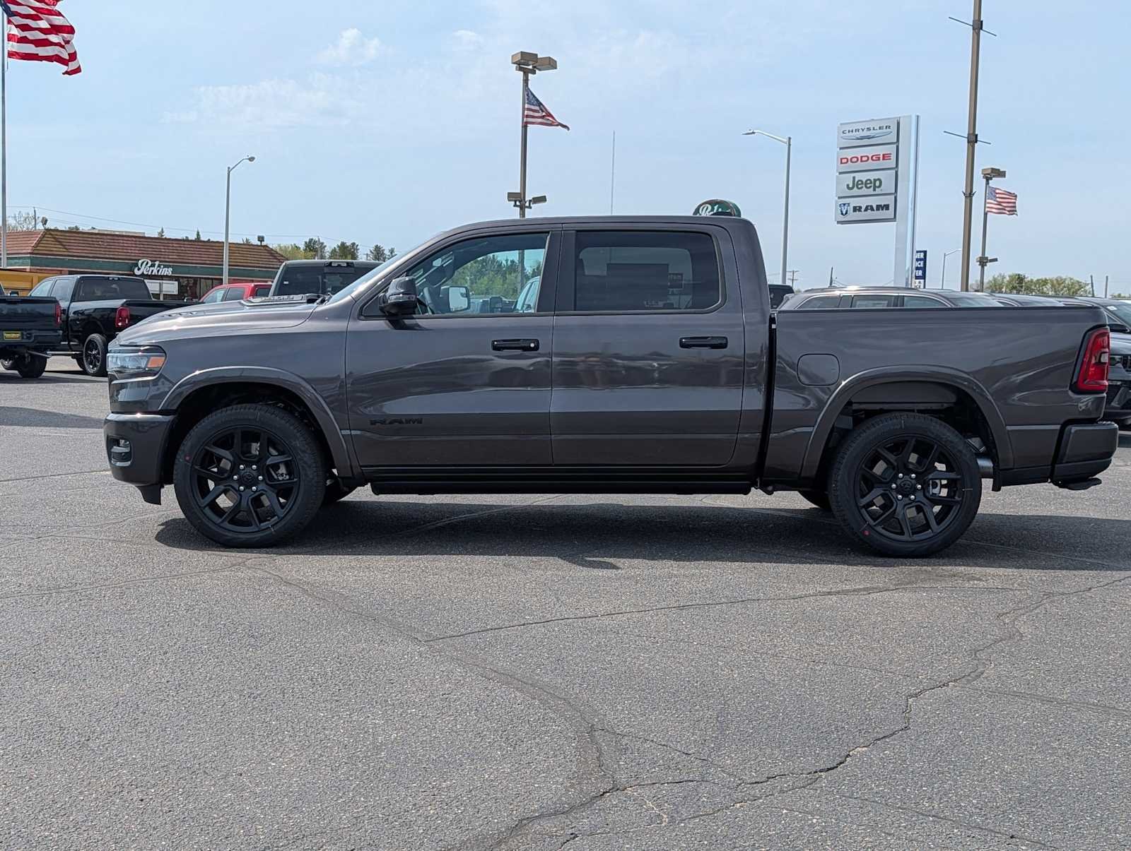 New 2026 Granite Crystal Metallic Clear-Coat Exterior Paint RAM Laramie image 4