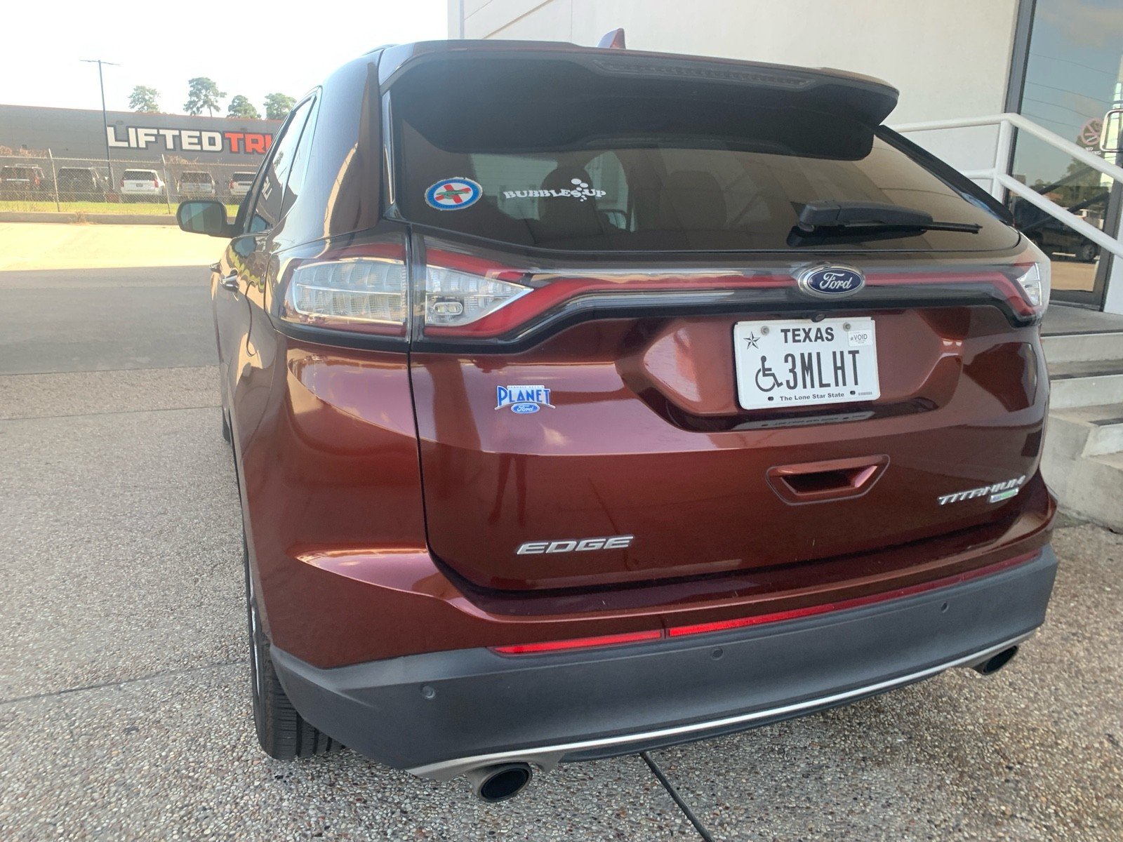 Used 2015 Bronze Fire Metallic Tinted Clearcoat Ford Titanium image 3