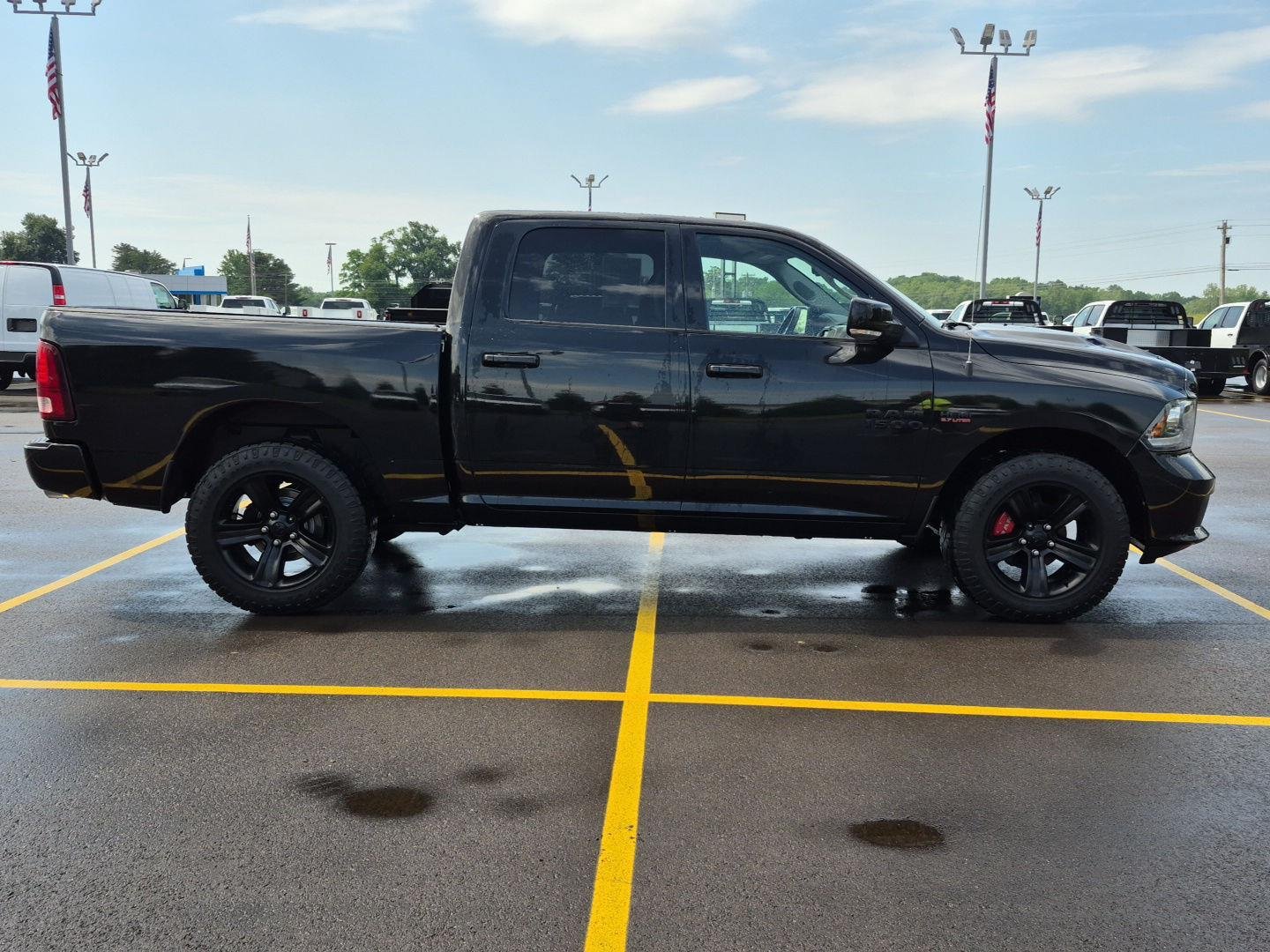 Used 2016 Brilliant Black Crystal Pearlcoat Ram Sport image 4