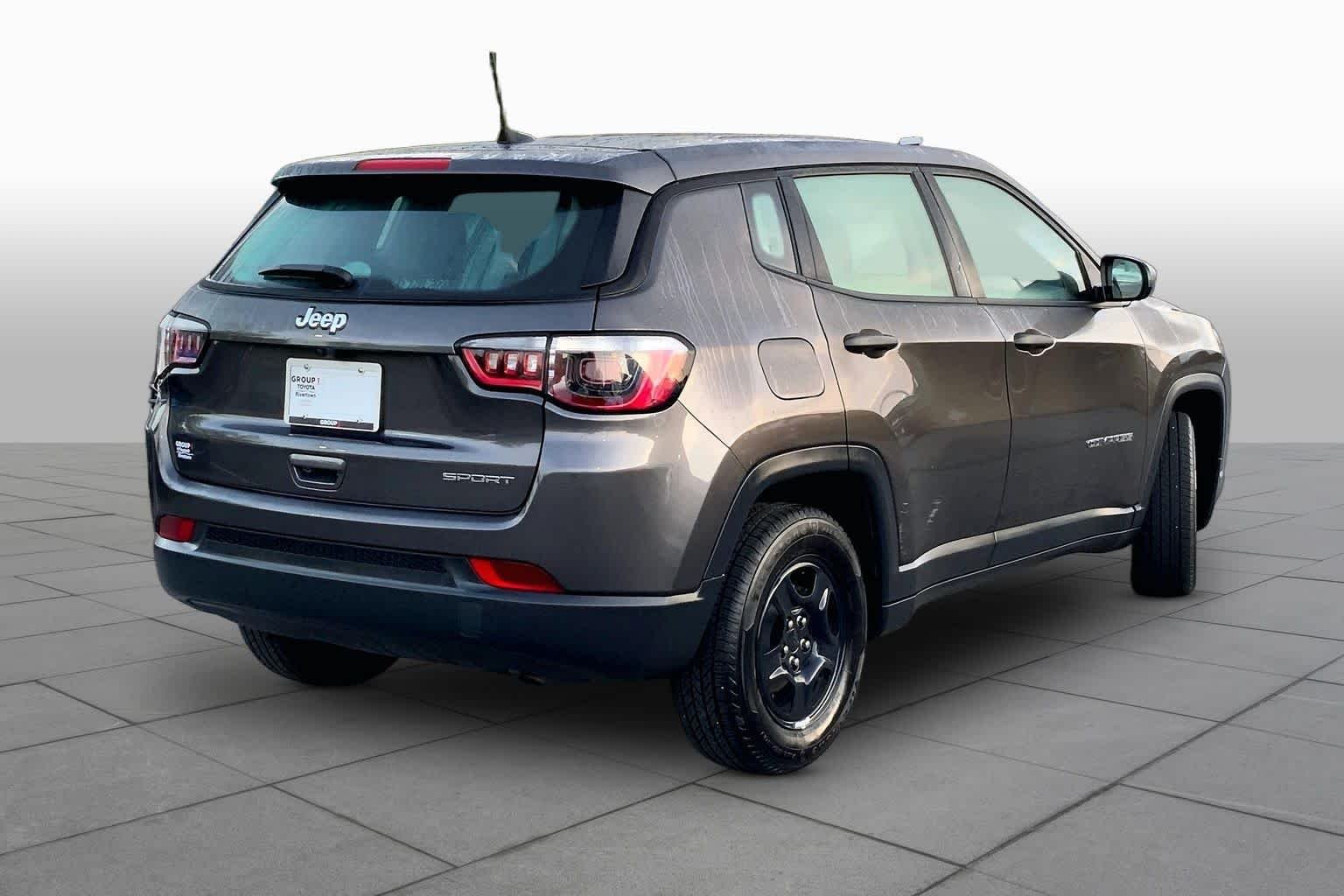 Used 2021 Granite Crystal Metallic Clearcoat Jeep Sport image 13