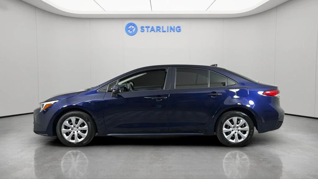Used 2025 Blue Toyota Hybrid LE image 4
