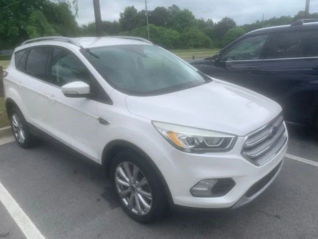 Used 2017 Ford Escape Titanium with VIN 1FMCU0J90HUB46459 for sale in Lilburn, GA