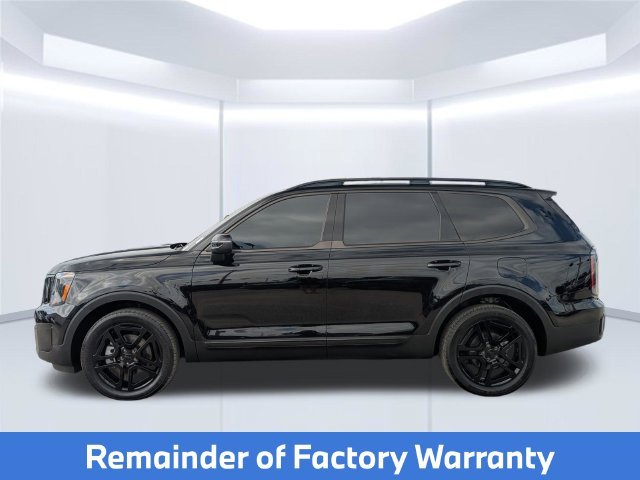 Used 2025 Black Kia EX X-Line image 2