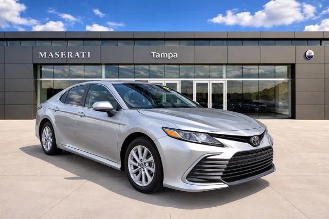 Used 2024 Celestial Silver Metallic Toyota LE image 1