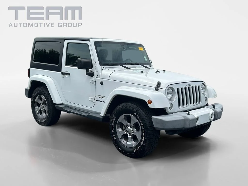 Used 2016 White Jeep Sahara image 1
