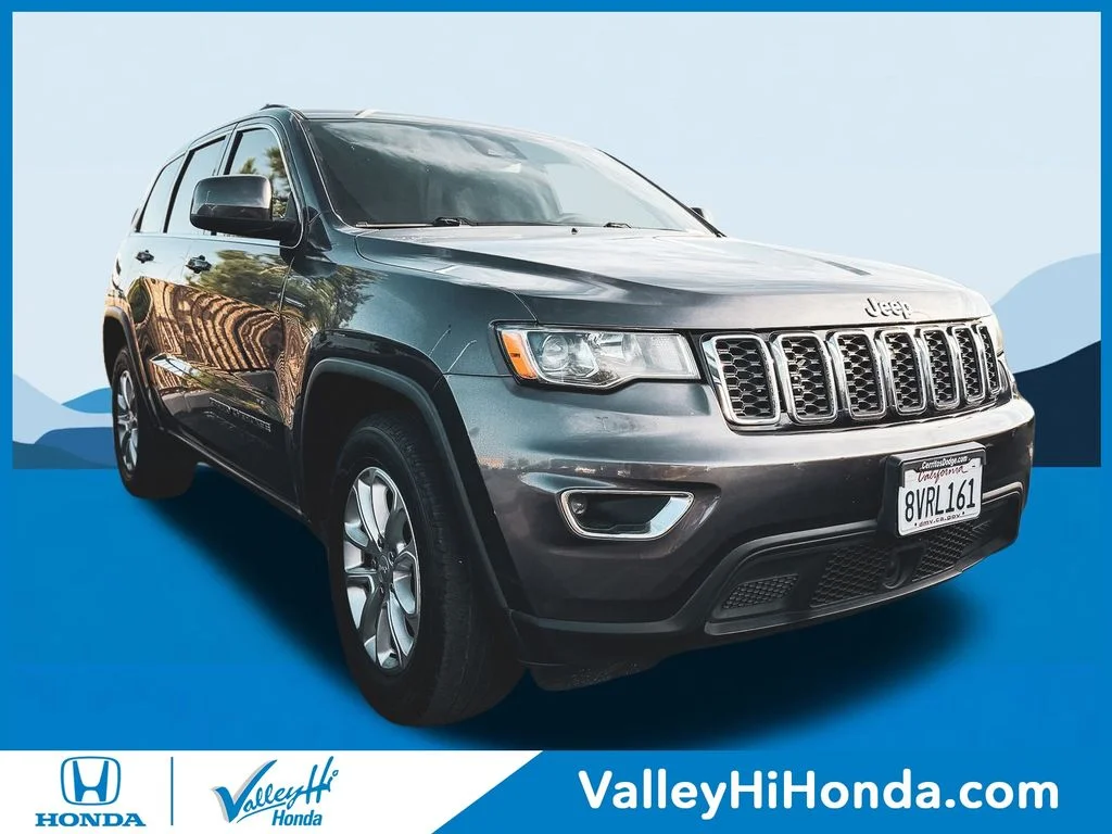 Used 2021 Gray Jeep Laredo E image 1