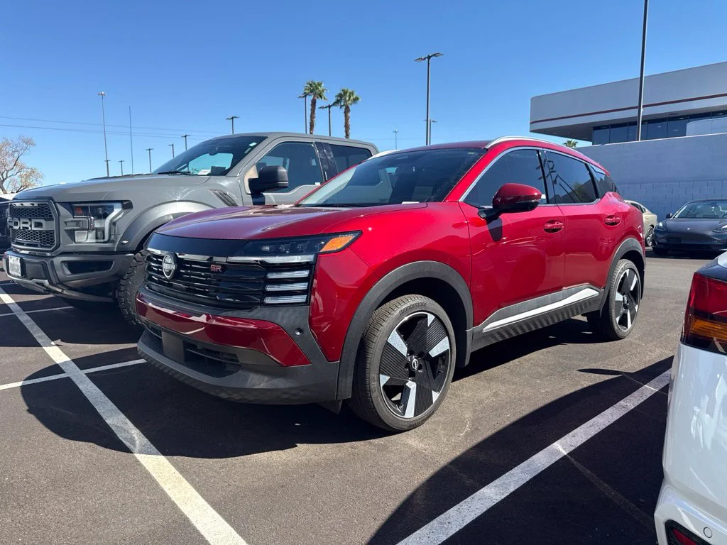 Certified Used 2025 Red Nissan SR image 1