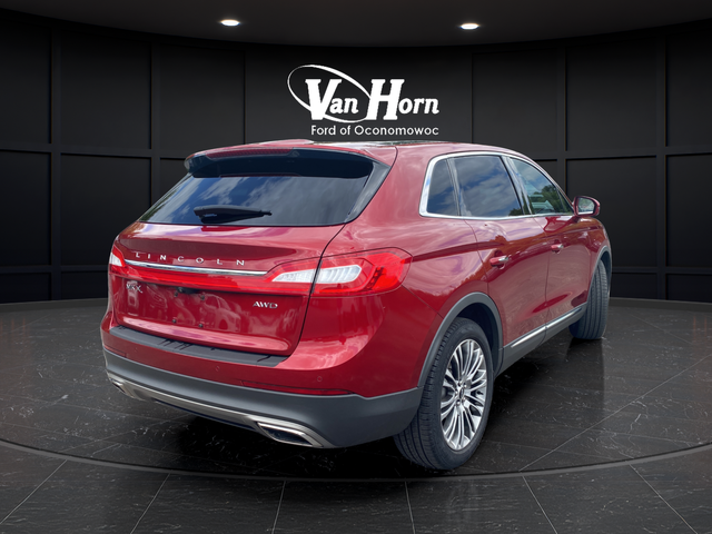 Used 2016 Ruby Red Metallic Lincoln Reserve image 7