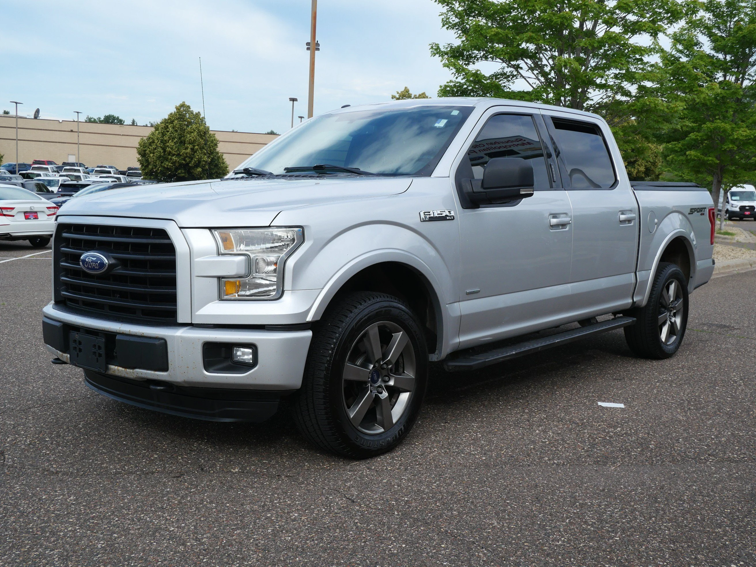 Used 2016 Ingot Silver Metallic Ford XLT 4WD SuperCrew 145 image 3
