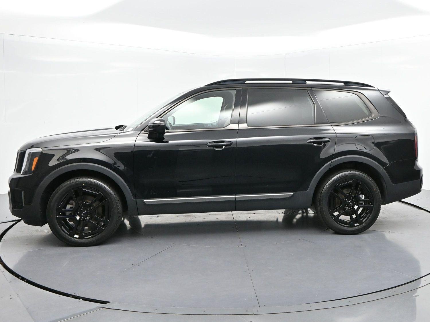 Used 2023 Ebony Black Kia EX X-Line image 4