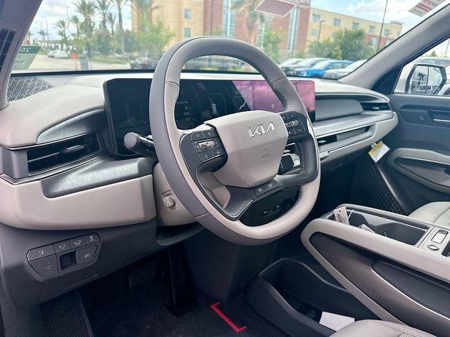 New 2026 Ivory Silver Kia Wind AWD image 9