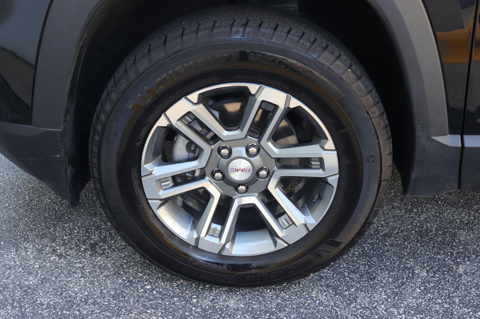 Used 2025 Ebony Twilight Metallic GMC AWD Elevation image 34