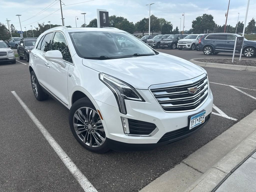 Used 2019 White Cadillac Premium Luxury image 1