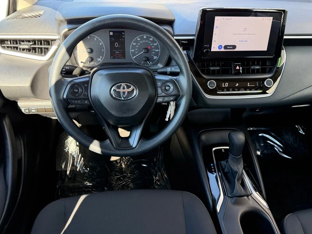 Used 2025 White Toyota LE image 10