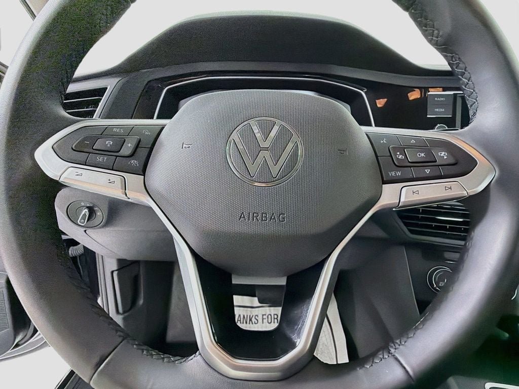 Used 2024 Deep Black Pearl Volkswagen S Automatic image 11