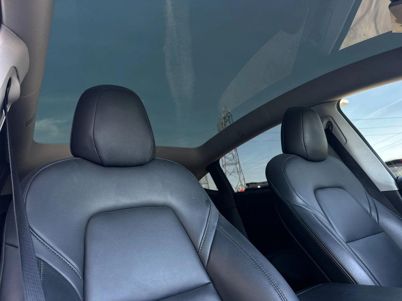 Used 2022 Solid Black Tesla Performance image 16