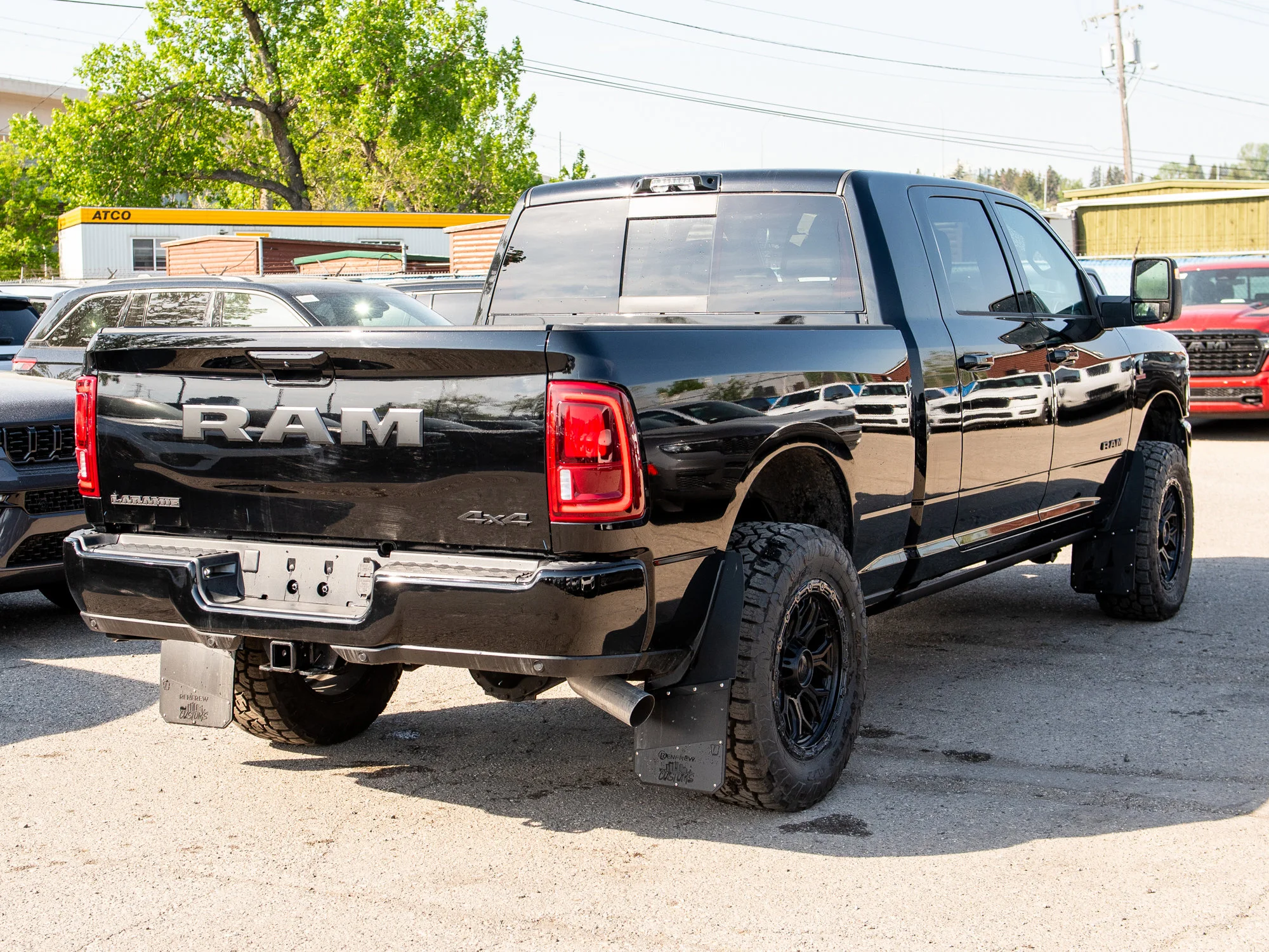 New 2026 Black RAM Laramie* Mega Cab, 2 Inch Lift, 35 Inch Tires, Trigger Industries Mudflaps image 9