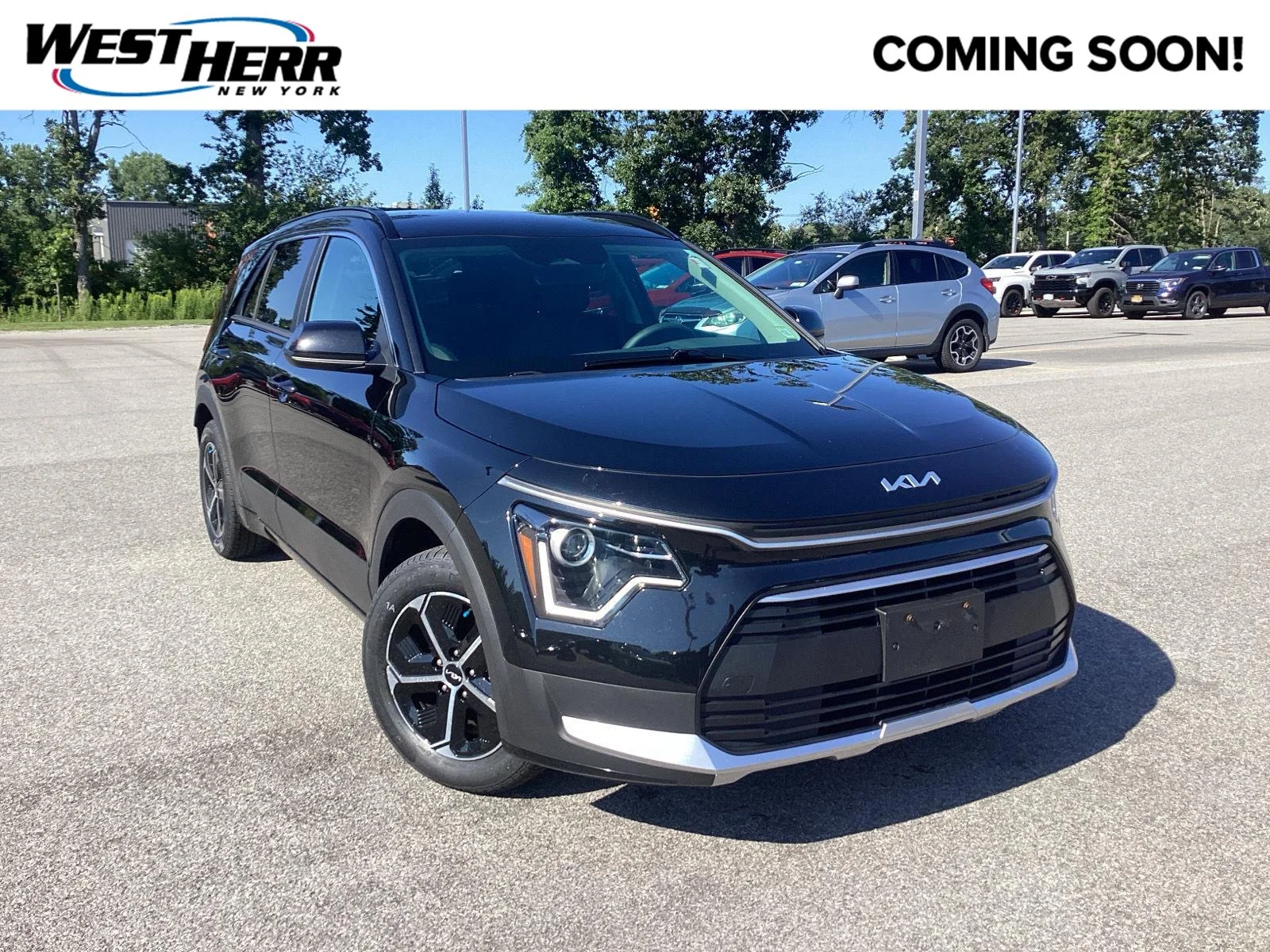 Used 2024 Aurora Black Pearl Kia LX image 1